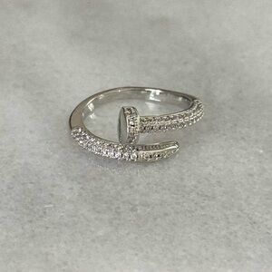 Silver Crystal Paved Nail Ring 

Brand New

Stainless Steel
